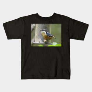Nuthatch throwing seed Kids T-Shirt